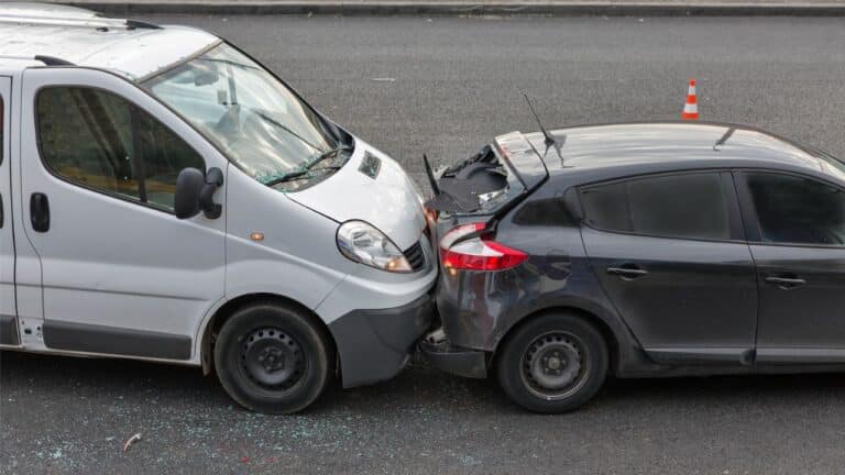 Rear end accident involving two cars on a city street